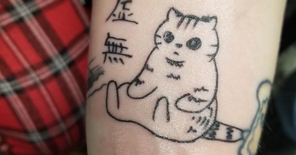 猫の隣の文字はどういう意味 とアメリカのタトゥー店員が聞いてきたので意味を教えた結果 Togetter